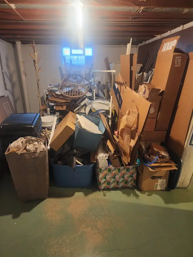 Roll-off dumpster container at job site for Yard Waste Dumpster Rental in Medina